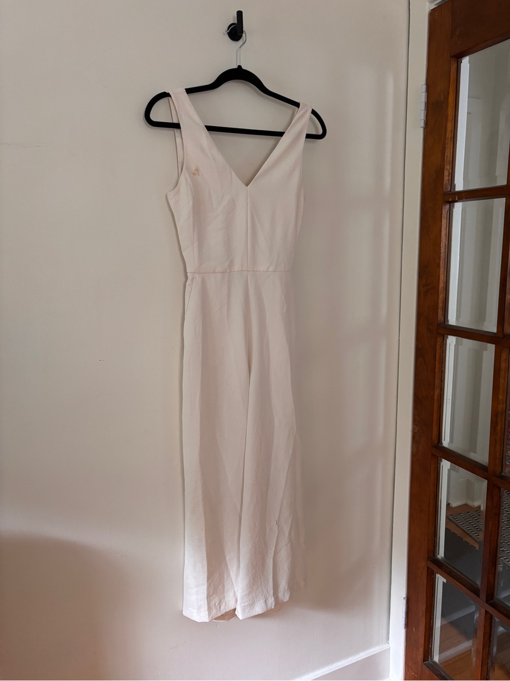 Sleeveless V-Neck Cream Jumpsuit with Tie Back